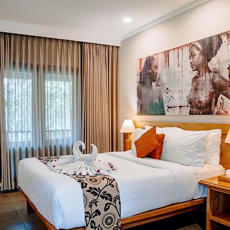 Puri Raja Hotel Legian Zewnętrze zdjęcie